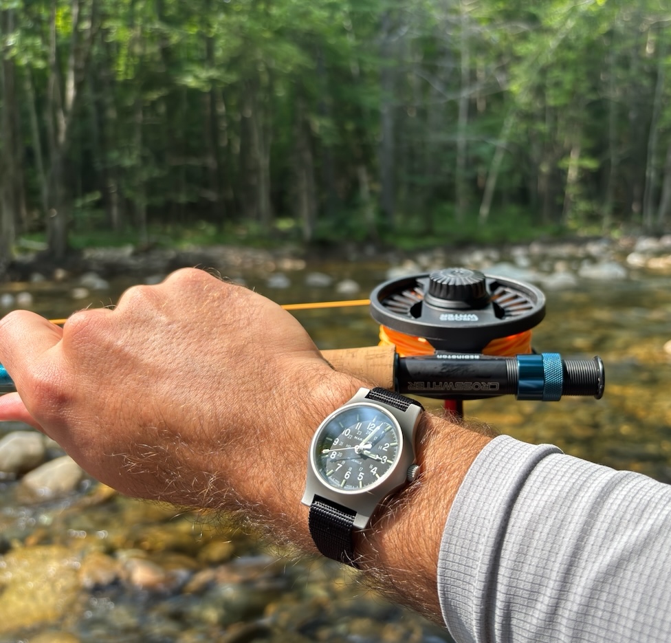 The Stainless Steel General Purpose Mechanical 36 mm field watch on a fishing trip in the White Mountains.
